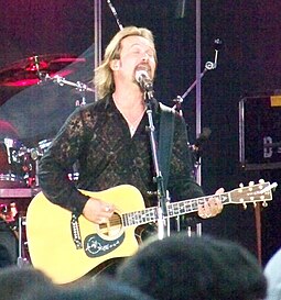 Travis Tritt also topped the chart for the first time in 1990. Travis Tritt crop.jpg