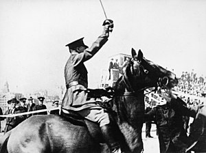 Captain de Groot declares the Sydney Harbour Bridge open in March 1932. De Groot cutting the ribbon.jpg