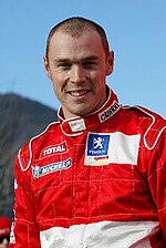 Richard Burns in 2003, with [[Peugeot Sport]]