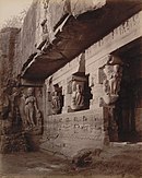 Photograph titled "Rameshwar cave [Ellora]" taken after the excavation was complete and the entire length of the goddess Ganga was revealed showing her standing on the aquatic monster Makara.