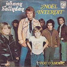 Johnny Hallyday with a group of children