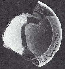 Pot excavated from the grotto bearing the following Arabic inscription:"This belongs to Boutros from al-Hadath". Pot Mari.jpg