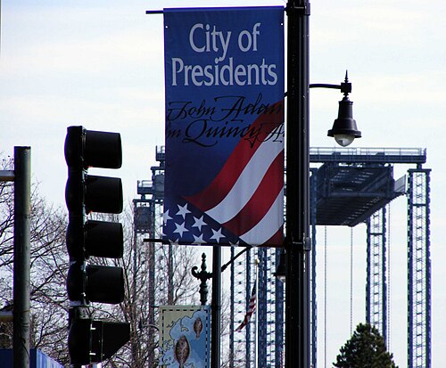 City of Presidents banner previously displayed on Route 3A. The temporary Fore River Bridge can be seen in the background.