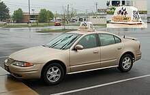 An Oldsmobile Alero used by a pizza delivery driver Pizza car.jpg