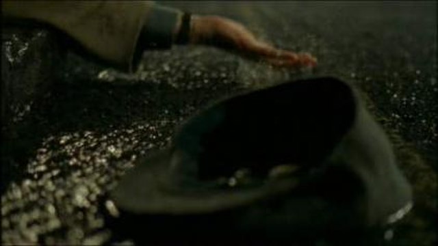 Victor Meldrew's hand and cap in the gutter after the accident