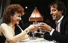 Angie and Den have dinner together on the Orient Express (1986). Dennis and Angie.jpg