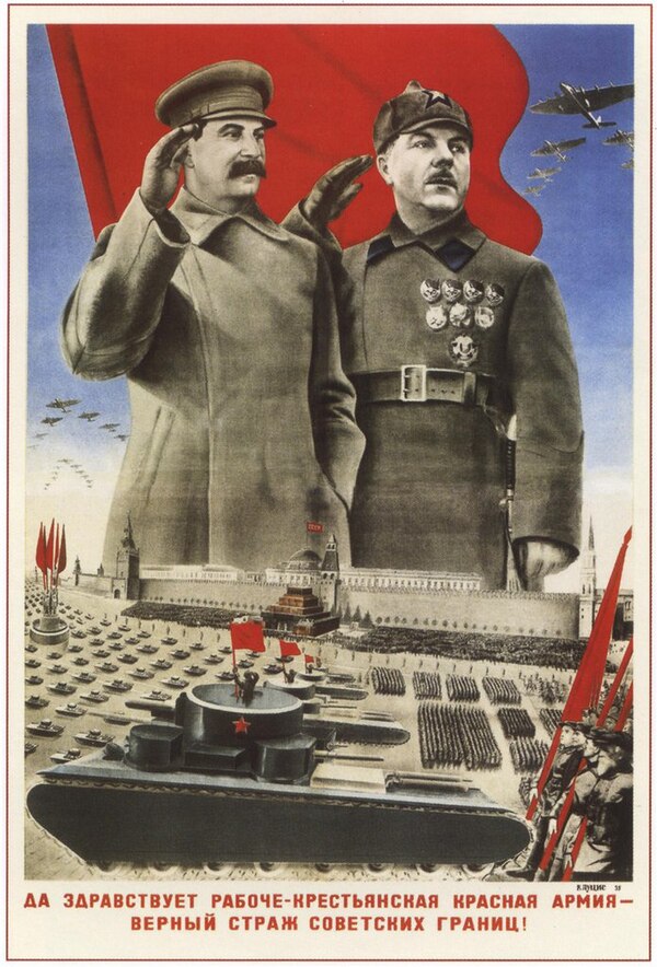 Joseph Stalin and Kliment Voroshilov depicted saluting a military parade in Red Square with T-35 featured.