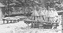 Staddle stones supporting beehives, circa 1880 StaddleStoneBeehives.jpg