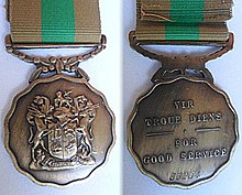 Third version, with raised rim on reverse but undecorated suspender Good Service Medal, Bronze c.jpg