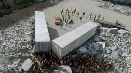 In the opening scene, many Alexandria citizens, led by Rick and his group, orchestrate Rick's plan at the quarry.