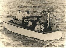 President Roosevelt catching a tarpon on a Farley Boat. Barney Farley is holding the tarpon. ROOSEFish.jpg