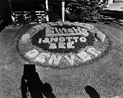 Flowerbed displaying the "Not to See Elitch's is Not to See Denver" slogan, c. 1916-1920. ElitchGardenFlowers1890 X27380.jpg