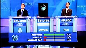 Watson, Ken Jennings, and Brad Rutter in their...