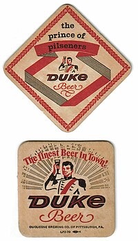 The obverse and reverse of an old Duquesne Beer coaster, showing some of the beer's branding BeerDukeBrewing.jpg