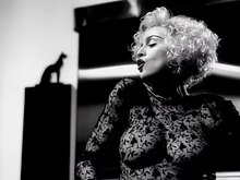 A scene showing Madonna wearing a sheer lace blouse, which she refused to remove following MTV's request Voguem.jpeg