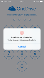 Screenshot of the passcode screen of OneDrive on iOS 11, with the prompt for Touch ID unlock displayed
