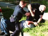 November 3, 2006: Video showing an LAPD officer striking William Cardenas 6 times in the face as he struggles to prevent the officers from handcuffing him. Cardenas-YouTube.jpg