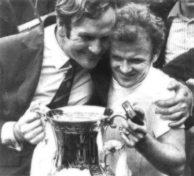 Revie (left) with Billy Bremner after winning the 1972 FA Cup final