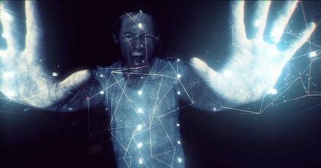 A screenshot of the music video, showing lead singer Chester Bennington being applied with digital effects.