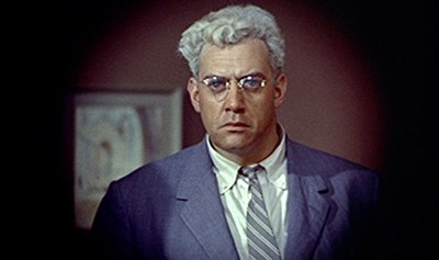 Lars Thorwald realizes that he is being watched across the courtyard by telephoto lens in Alfred Hitchcock's Rear Window (1954), which offered Burr hi