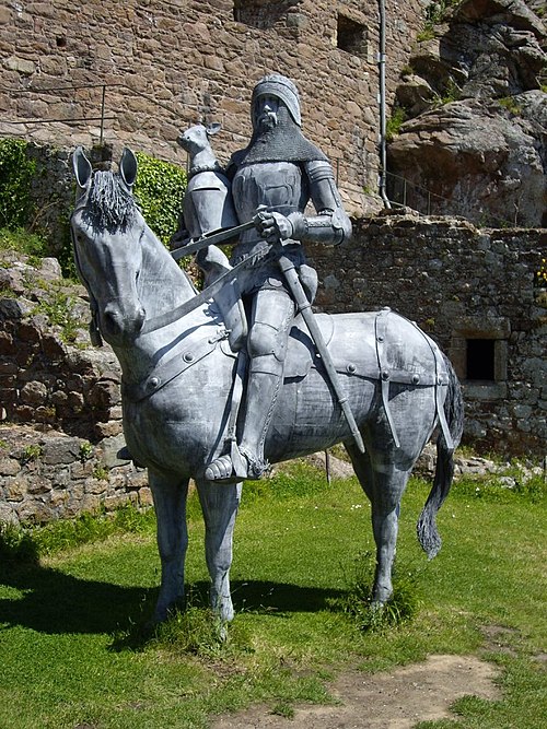 Modern equestrian statue of Sir Hugh Calveley at Mont Orgueil Castle, Jersey. Atop his helm is the canting crest of Calveley: A calf's head sable crow