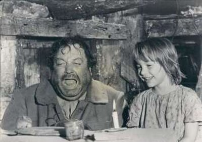 Gigot (Jackie Gleason) and Nicole (Diane Gardner) cater a mouse's dinner in Gigot.