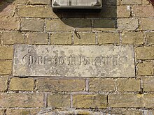 Inscription above Village Hall entrance - "Christo in Parvulis" meaning "For Christ in the dear little children" Pertenhall Village Hall Inscription.jpg