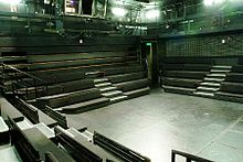 The stage of the Cockpit Theatre, London, has seating on four sides with a capacity of 240. Cockpit Theatre (Marylebone) - Auditorium.jpg