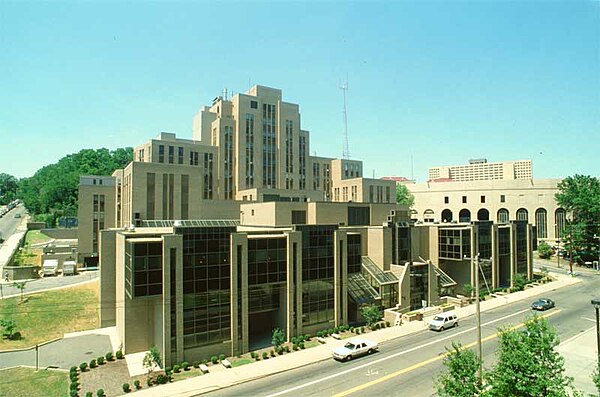 Salk Hall is named after Jonas Salk who conducted history-making research there. Pitt Stadium, seen in the background to the right, was torn down in 1