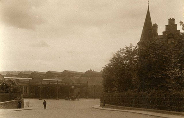 The original entrance to the station, pictured around 1900 and viewed from Leonard Street. The Station Hotel is on the right