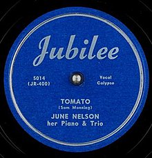Джун Нельсон Tomato.jpg