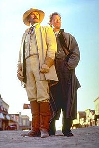 Richard Dean Anderson and John de Lancie as Ernest Pratt and Janos Bartok LegendBartok.jpg