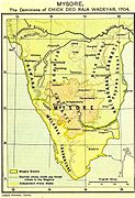 Um mapa do sul da Índia mostra um grande Mysore limitado pelas costas de Kanara, Malabar e Travancore a oeste e sudoeste, e por Hyderabad Carnatic a leste e sudeste.