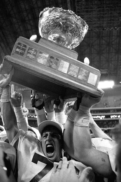 The Vanier Cup raised in 1990 by the Saskatchewan Huskies following their win over Saint Mary's.