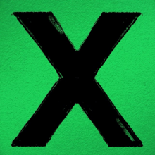 A large black x in a green background