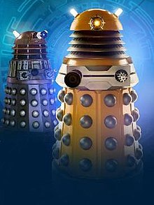 Examples of a New Paradigm Dalek (foreground) and a "New Series" Dalek (background), as seen in the Doctor Who science fiction television programme. Daleks 2005 and 2010.jpg