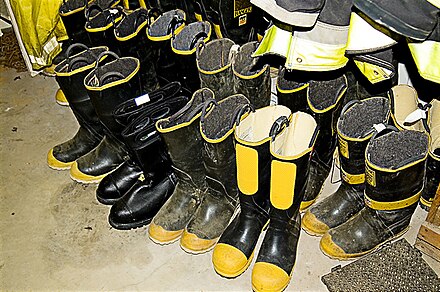 Several pairs of surplus firefighter boots