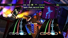 DJ Hero 2 includes support for three players to play at the same time - two on turntables and one vocalist. Djhero2-screen.jpg