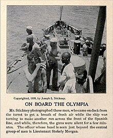 Gun crew of USS Olympia forward 8" turret that fired the first shot of the Battle of Manila Bay Men of USS Olympia forward 8 inch turret Battle of Manila Bay 1898.jpg