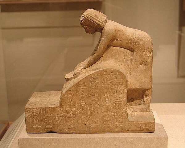 Senenu, High Priest of Amūn at Deir El-Baḥri, grinding grain, c. 1352–1292 B.C. (to the end of the 18th Dynasty), Limestone, Brooklyn Museum.