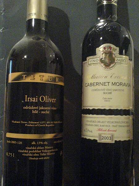 Two bottles of Moravian wine (an Irsai Oliver and a Cabernet Moravia), showing the usual labeling for geographical origin