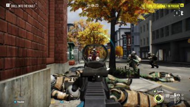 A screenshot of a player engaging with enemies during an assault wave in a bank heist.