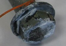Electroplated and yellow chromated bolt with white corrosion Whiterust.jpg