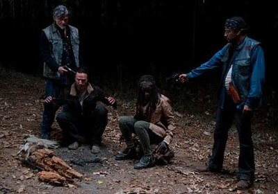 The Claimers confront Rick and Michonne.