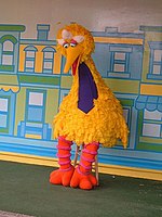 A walk-around character of Big Bird, at a theme park.