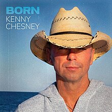 A head-shot of Kenny Chesney in a gray shirt and straw hat, against a blue background. The word "Born" is in the upper-left corner in blue, and underneath it are the words "Kenny Chesney" in white.