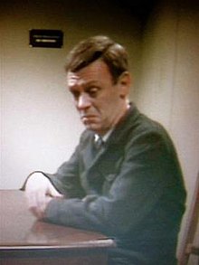 Hunter as Lonely in a prison scene from Callan