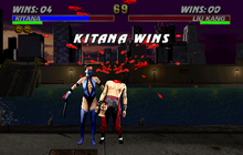 Kitana performing a decapitation Fatality finishing move on Liu Kang