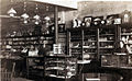 Inside the Fred J. Strain store, with Fred J. Strain and his daughter, Pearl. Photo taken about 1930.