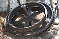Cable drive bull wheel salvaged from the Incline Powerhouse prior to demolition in 1962. The assembly stands as a monument to the Mount Lowe Railway.